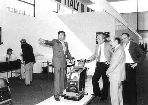 Giancarlo Ruffo with customers at a trade fair